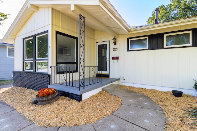 doorway to property featuring a porch