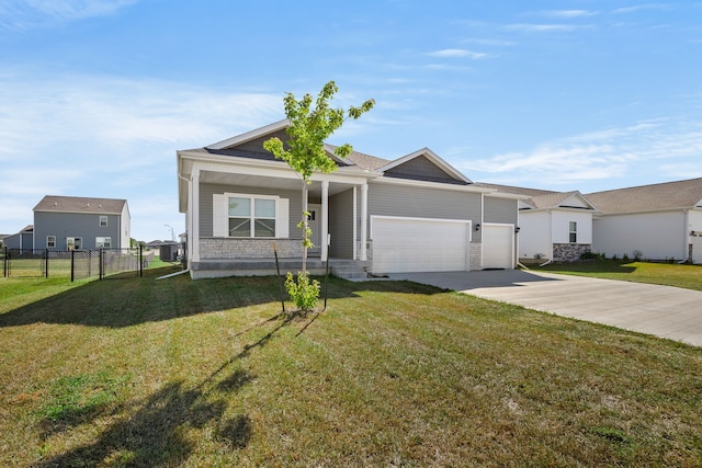 single story home with a garage and a front lawn