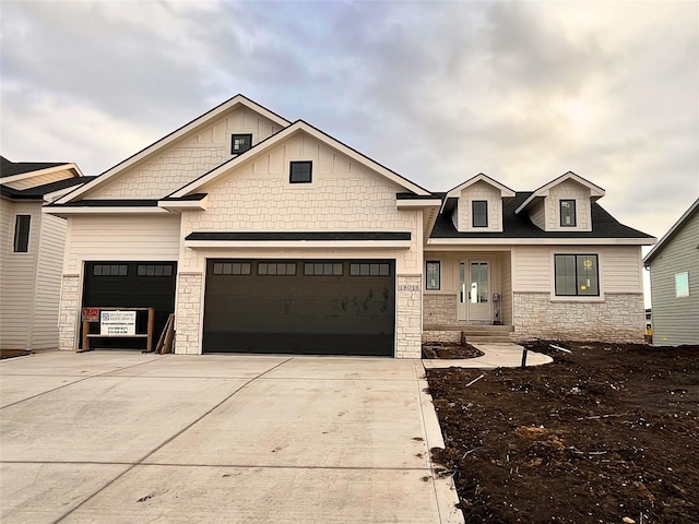 view of front of property with a garage