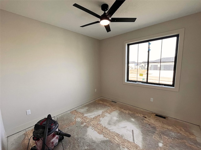 spare room with ceiling fan