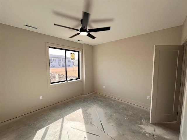 spare room with ceiling fan