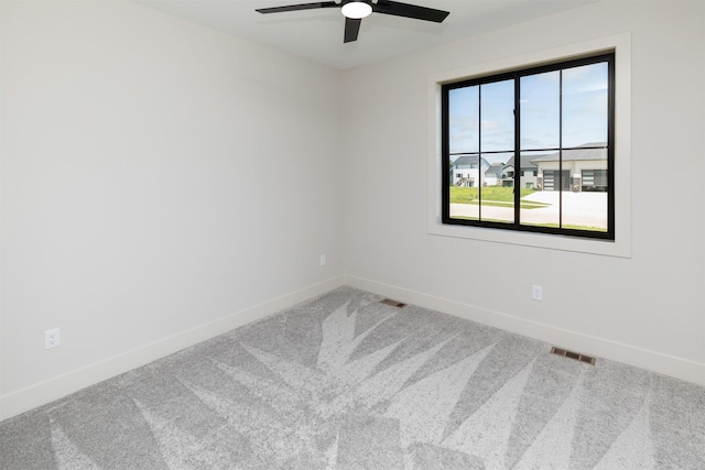 18016 Tanglewood Dr, Clive, IA 50325 - carpeted empty room featuring a ceiling fan and baseboards