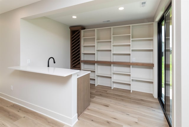 18016 Tanglewood Dr, Clive, IA 50325 - spacious closet featuring light wood-type flooring