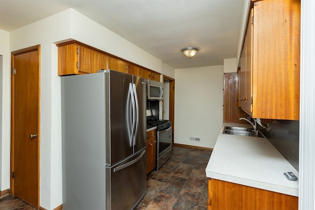 kitchen with stainless steel appliances and sink