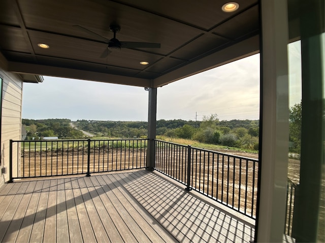 wooden deck with ceiling fan