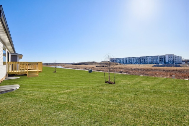 view of yard featuring a deck