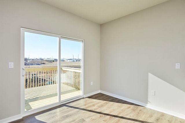 empty room featuring hardwood / wood-style floors