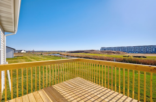 deck featuring a lawn