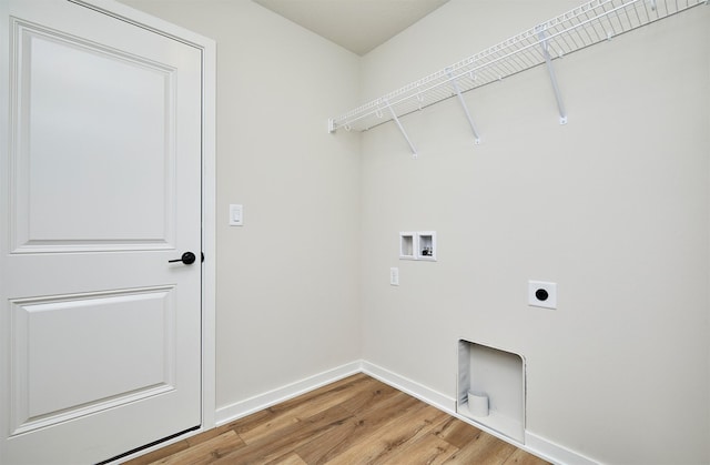 laundry area featuring hardwood / wood-style flooring, electric dryer hookup, and hookup for a washing machine