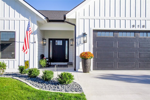 doorway to property featuring a garage