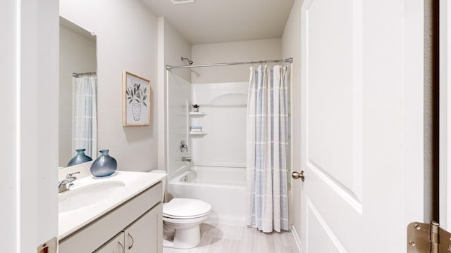 419 Creekview Ave, Polk City, IA 50226 - bathroom featuring toilet, shower / bath combo with shower curtain, and vanity