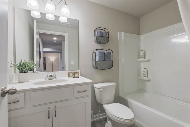 full bathroom with toilet, vanity, tile patterned flooring, and  shower combination