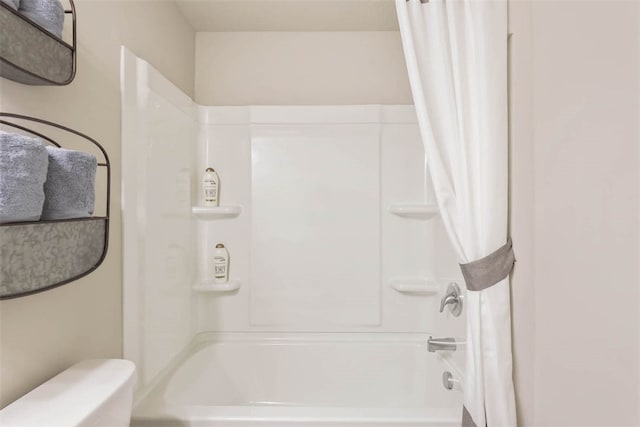 bathroom with shower / bath combination with curtain