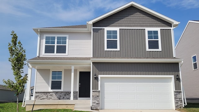 craftsman house with a garage