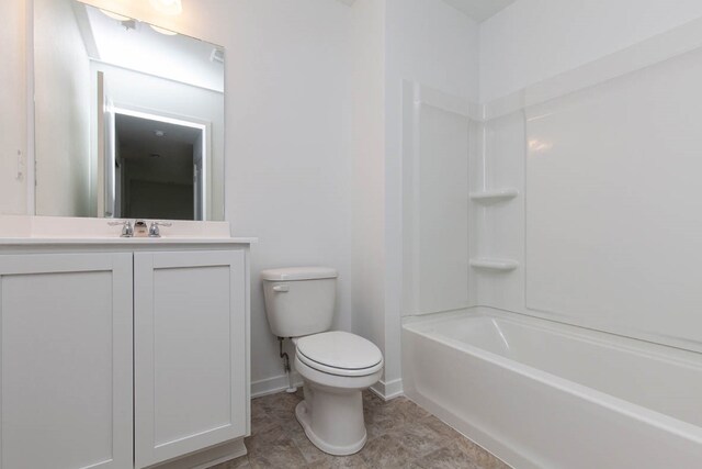 full bathroom featuring toilet, vanity, and shower / washtub combination