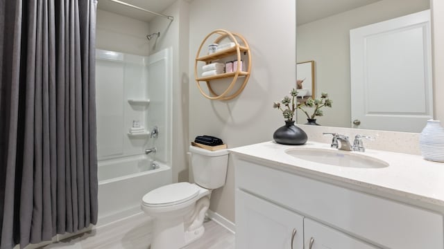 full bathroom featuring hardwood / wood-style floors, vanity, shower / bath combination with curtain, and toilet