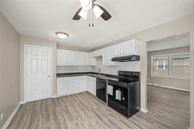 kitchen with white cabinets, black appliances, ceiling fan, and light wood-type flooring