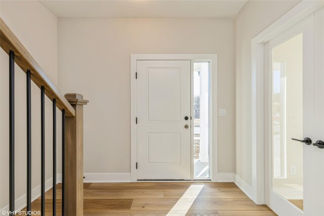 foyer entrance featuring light hardwood / wood-style flooring