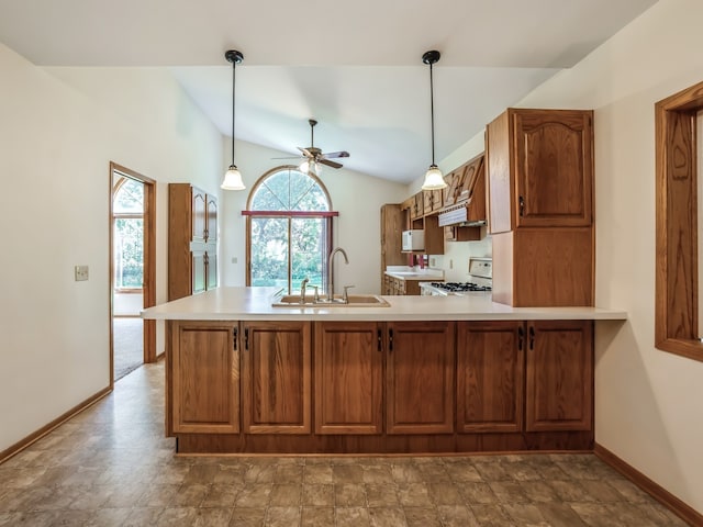 kitchen with hanging light fixtures, white appliances, lofted ceiling, and ceiling fan