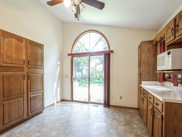 kitchen featuring ceiling fan