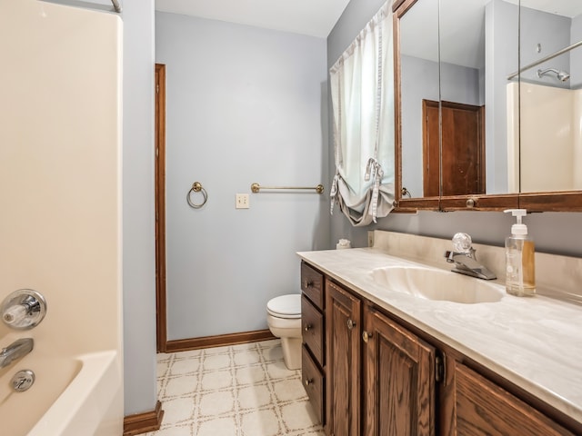 full bathroom with shower / washtub combination, vanity, and toilet