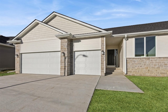 ranch-style house featuring a garage