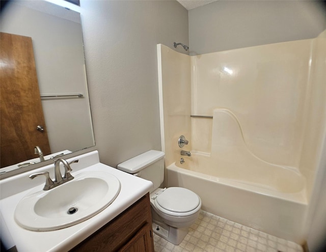 full bathroom featuring tile patterned floors, shower / tub combination, vanity, and toilet