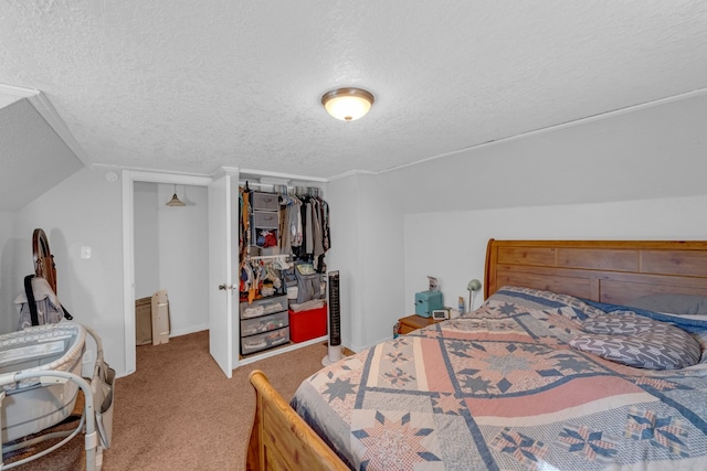 bedroom featuring carpet floors, a textured ceiling, and vaulted ceiling