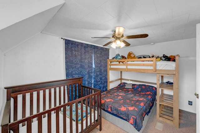 2329 Maple St, Des Moines, IA 50317 - carpeted bedroom with a ceiling fan and lofted ceiling