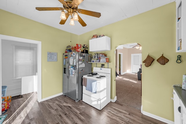 kitchen with white cabinetry, dark wood-type flooring, ceiling fan, stainless steel refrigerator with ice dispenser, and white range with electric cooktop