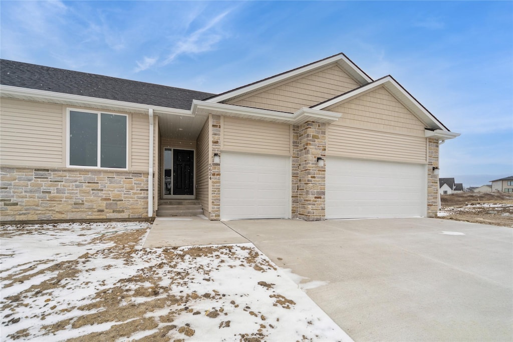 view of front of property with a garage