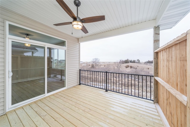 wooden terrace with ceiling fan