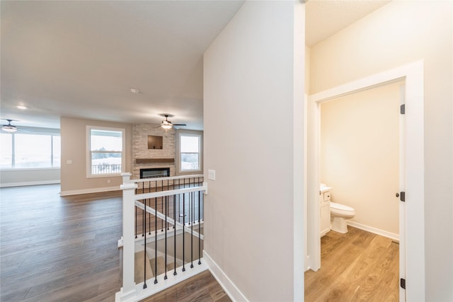 hallway featuring hardwood / wood-style flooring