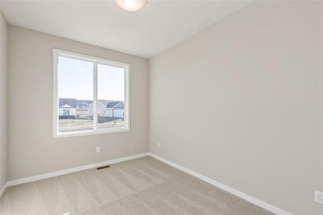 view of carpeted spare room