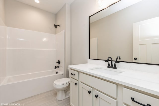 full bathroom featuring vanity, shower / tub combination, and toilet