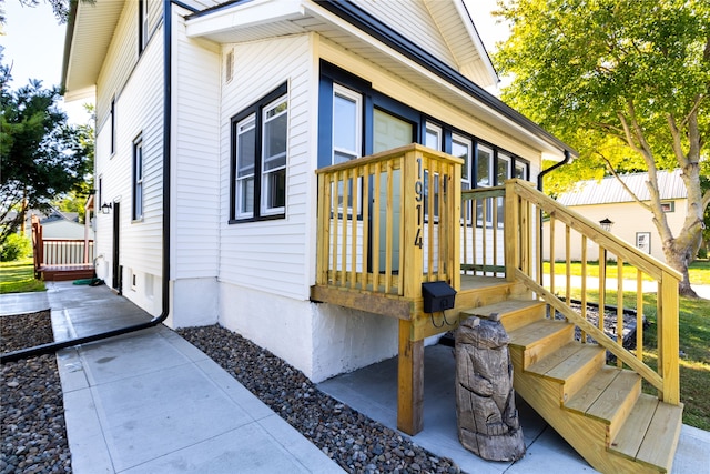 view of home's exterior with a deck