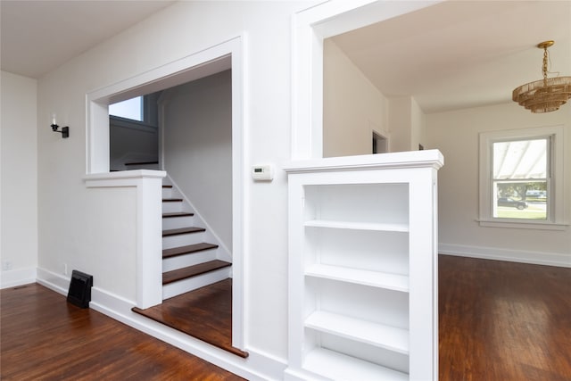 staircase featuring hardwood / wood-style flooring