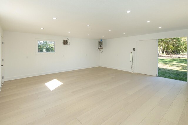 spare room featuring light hardwood / wood-style flooring