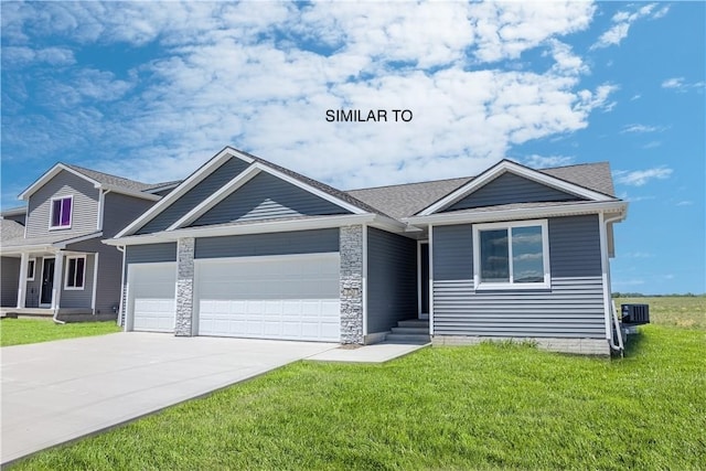 view of front of property with a front yard, central AC, and a garage