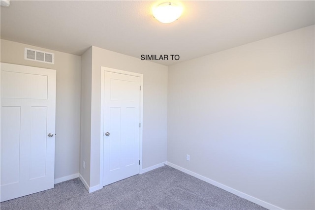 unfurnished bedroom featuring carpet flooring