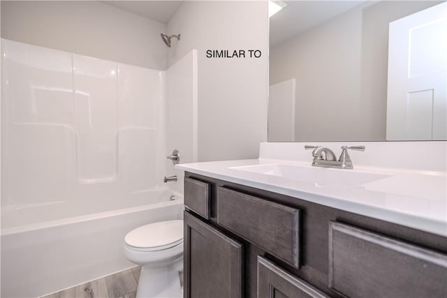 full bathroom featuring wood-type flooring, vanity, toilet, and shower / bathtub combination