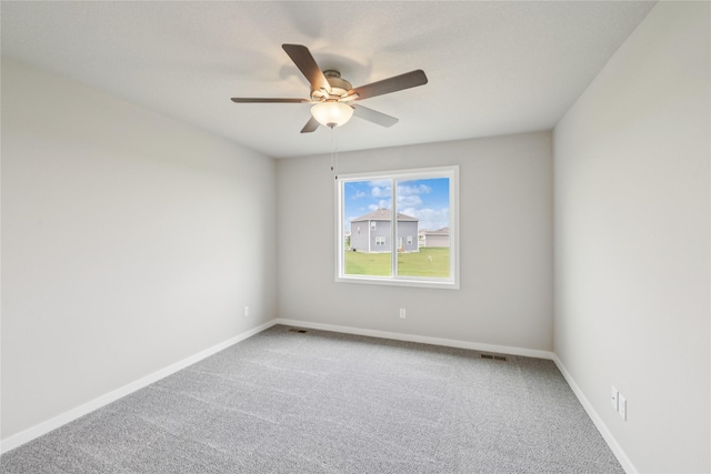 4428 NE 8th St, Ankeny, IA 50021 - carpeted spare room featuring ceiling fan and baseboards