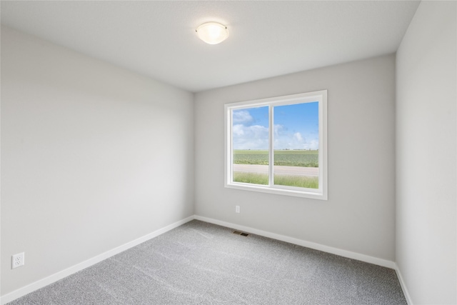 4428 NE 8th St, Ankeny, IA 50021 - unfurnished room featuring carpet flooring and baseboards