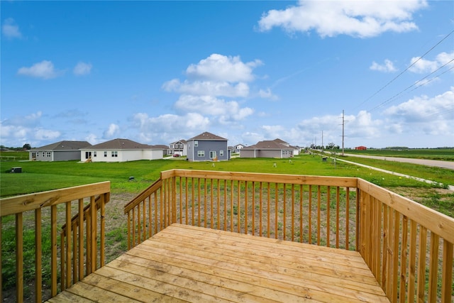 4428 NE 8th St, Ankeny, IA 50021 - wooden deck featuring a residential view and a lawn