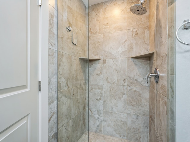 bathroom with an enclosed shower