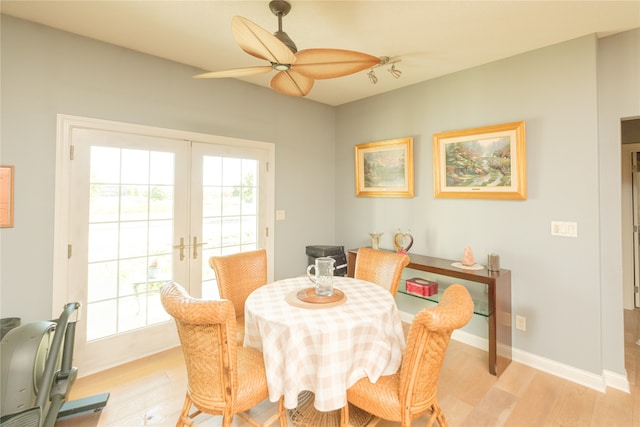 dining area featuring french doors, light hardwood / wood-style floors, and ceiling fan