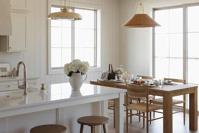 dining area with light wood-style floors