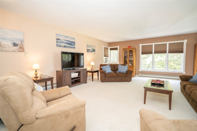 living room with carpet floors and a baseboard heating unit