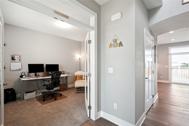 home office featuring hardwood / wood-style flooring