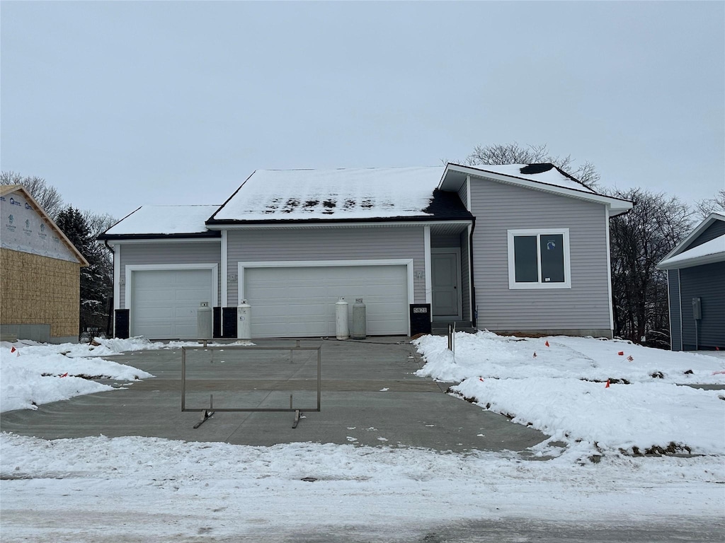 single story home with a garage